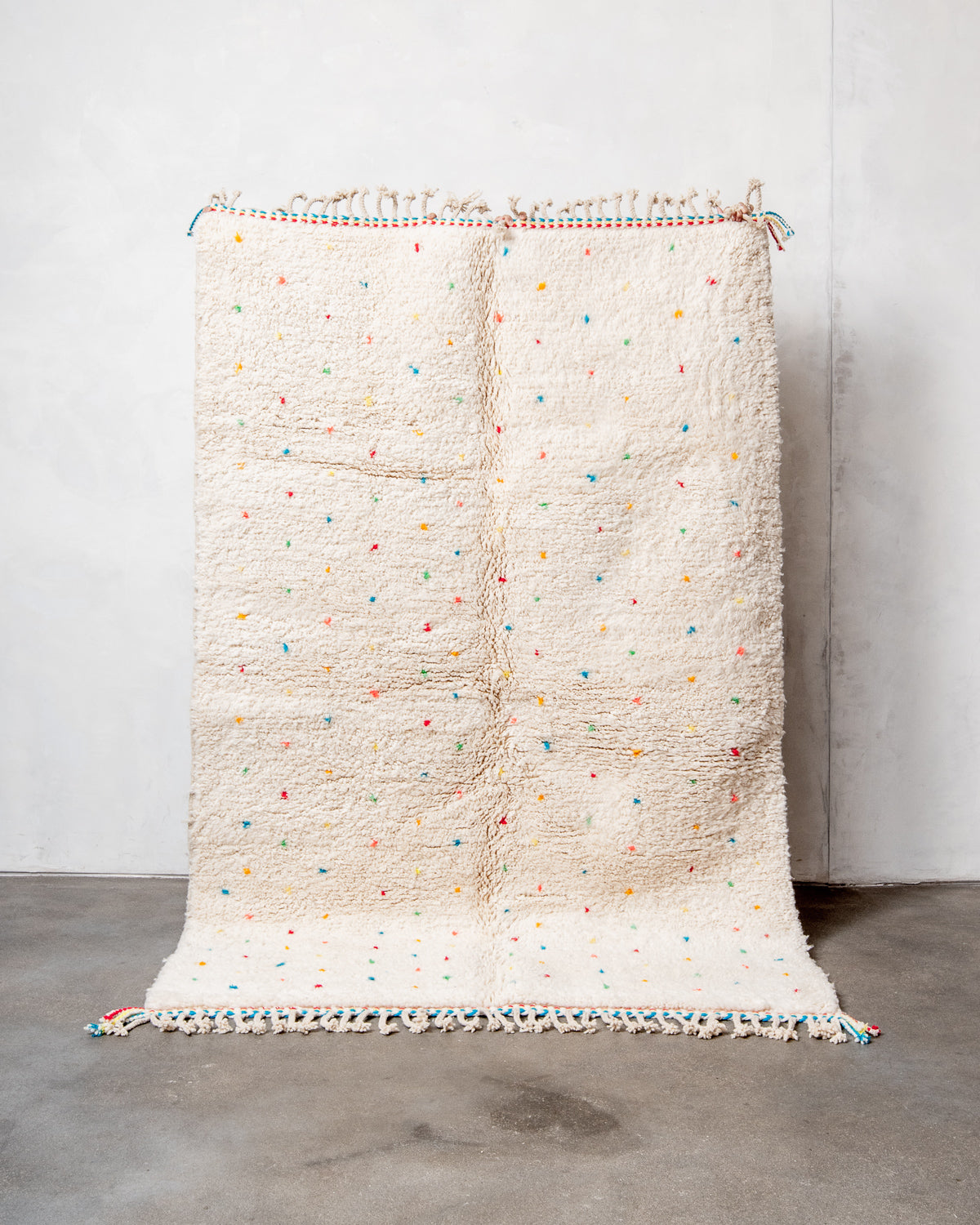 Modern, designer, handcrafted Berber rug from Morocco. Beniourain carpet with beautiful colours and patterns and fluffy wool texture.